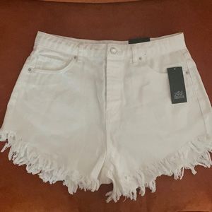 White Jean shorts. NEVER WORN!